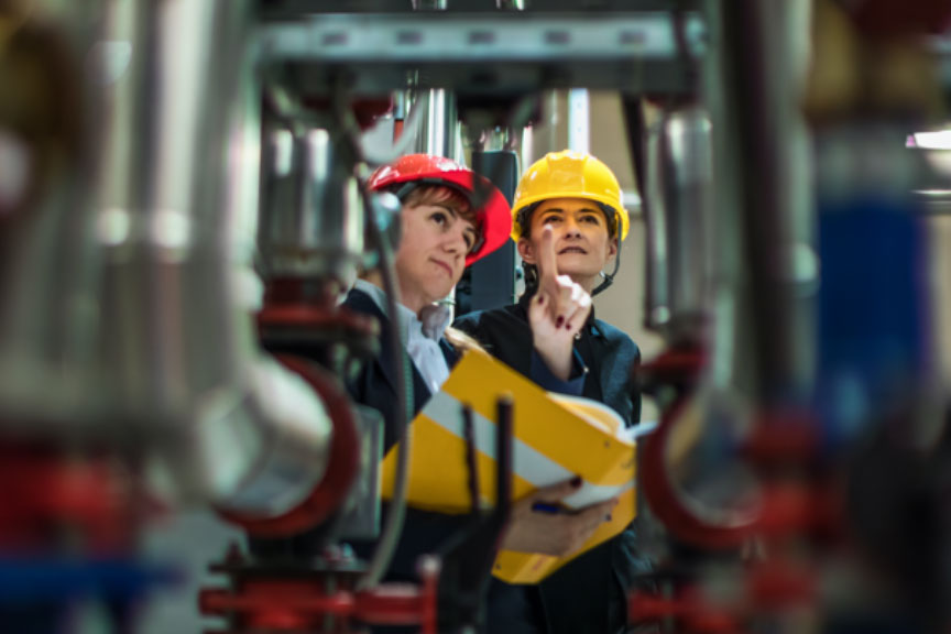 industrial image with people in hard hats